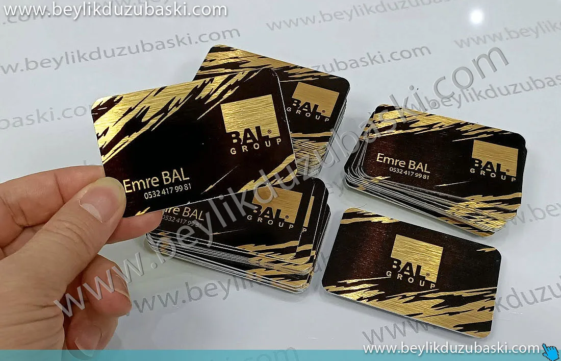 metal kartvizit, bal group metal kartvizit, altın rengi metal kart, sarı metal kartvizit, kaliteli kartvizit, pahalı kartvizit, özel imalat kartvizit