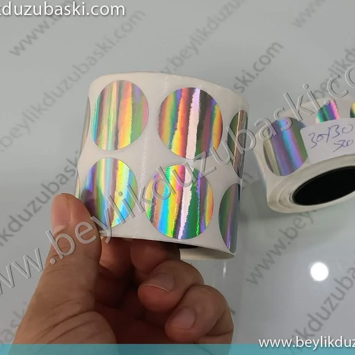 hologram etiket, renkli hologram görünümlü, güvenlik etiketi, yuvarlak hologram etiket, acil etiket baskısı, kaliteli hologram etiket, yuvarlak kesim parlak etiket