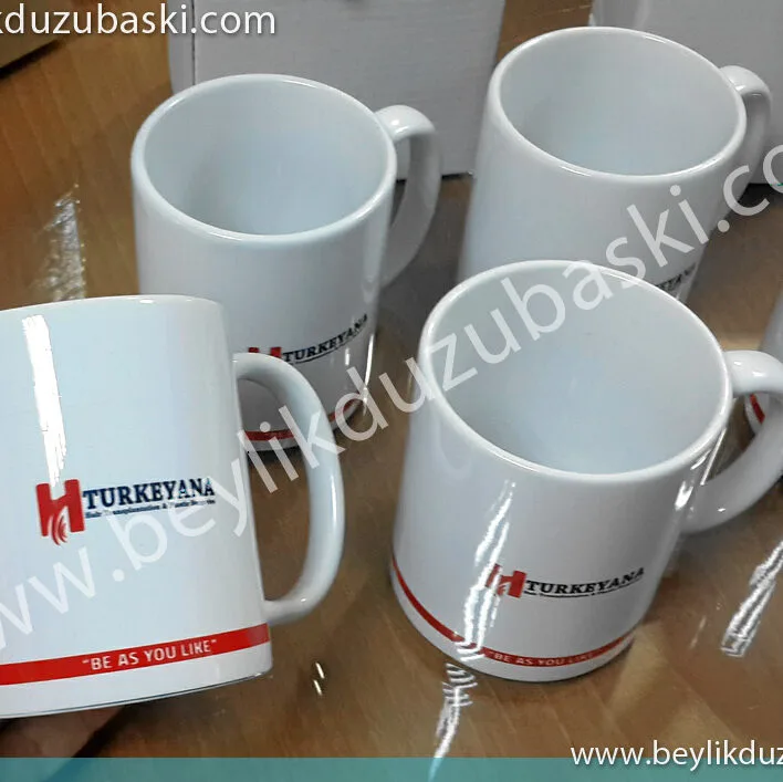 t-shirt ve kupa baskı, ayrı ayrı ürünlere, aynı logo baskısı yapılmıştır, acil üretim yapılmaktadır, beylikdüzü baskı merkezi