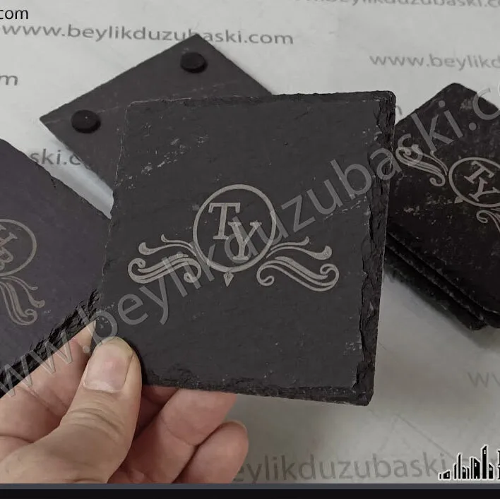 taş üzerine baskı, lazer ile siyah taş, siyah bardak altına lazer ile baskı, kaliteli lazer markalama, viski bardak altı, üzerine lazer ile logo baskı