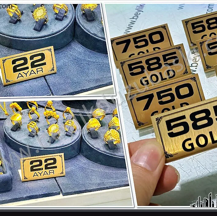 6x3 cm ebadında küçük ebat, Kuyumcu vitrin yazısı, altın rengi metal plaka, 22 ayar, 14 ayar, 8 ayar altın tabelası, 18K 14 K, altın kuyumcu vitrin yazısı, 585 Gold, 925 Silver vitrin tabelası, kuyumcu altın ayarı bildiren, vitrin tabelası, kuyumcu vitrin tabelası